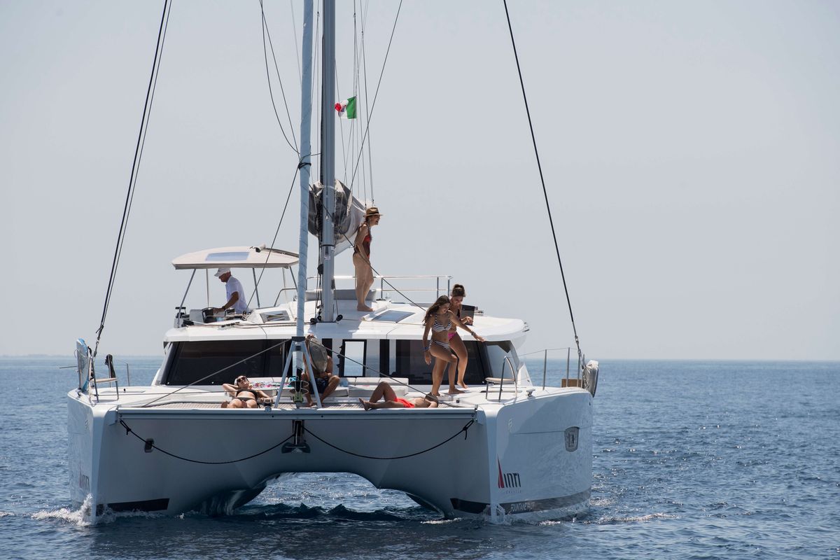 Exterior view of Premium, a Fountaine Pajot Saona 47 catamaran at Castellammare del Golfo, Italy