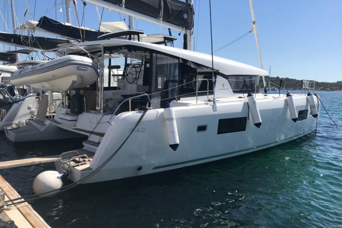 Exterior view of Zippiri, a Lagoon 42 catamaran at Olbia, Italy