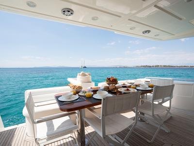 Deck of ESCAPE, a Ferretti 630 yacht at Ornos, Greece