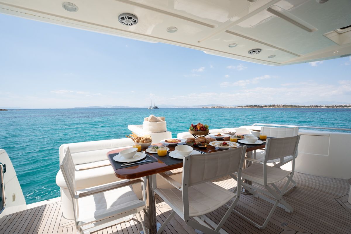 Deck of ESCAPE, a Ferretti 630 yacht at Ornos, Greece