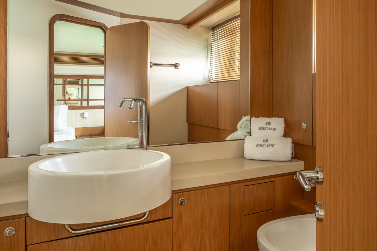 Head on ESCAPE, a Ferretti 630 yacht at Ornos, Greece