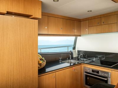 Galley of ESCAPE, a Ferretti 630 yacht at Ornos, Greece