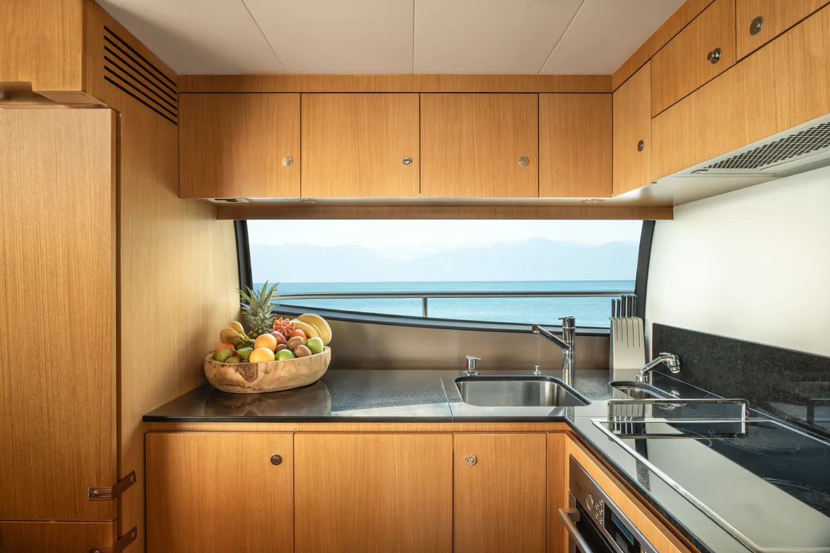 Galley of ESCAPE, a Ferretti 630 yacht at Ornos, Greece