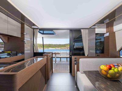 Salon of Premium +, a Prestige M48 catamaran at Olbia, Italy