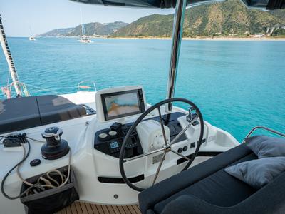 Cockpit of Vega, a Lagoon 55 catamaran at Capo d'Orlando, Italy