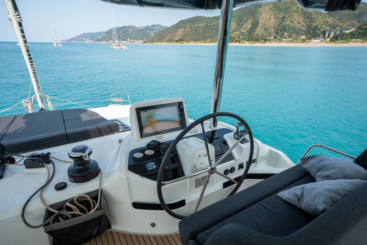 Cockpit of Vega, a Lagoon 55 catamaran at Capo d'Orlando, Italy