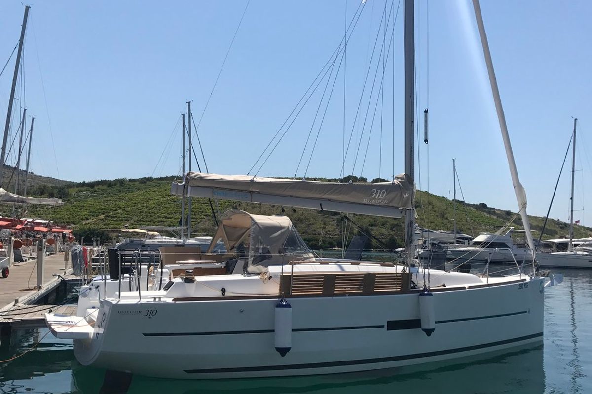 Exterior view of Mio, a Dufour 310 GL sailboat at Primošten, Croatia