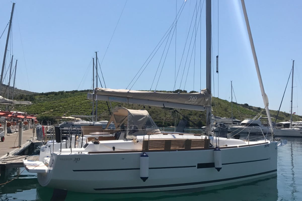 Exterior view of Mio, a Dufour 310 GL sailboat at Primošten, Croatia