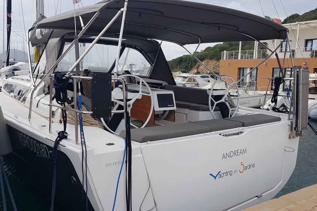 Exterior view of Andream, a Dufour 430 sailboat at Olbia, Italy
