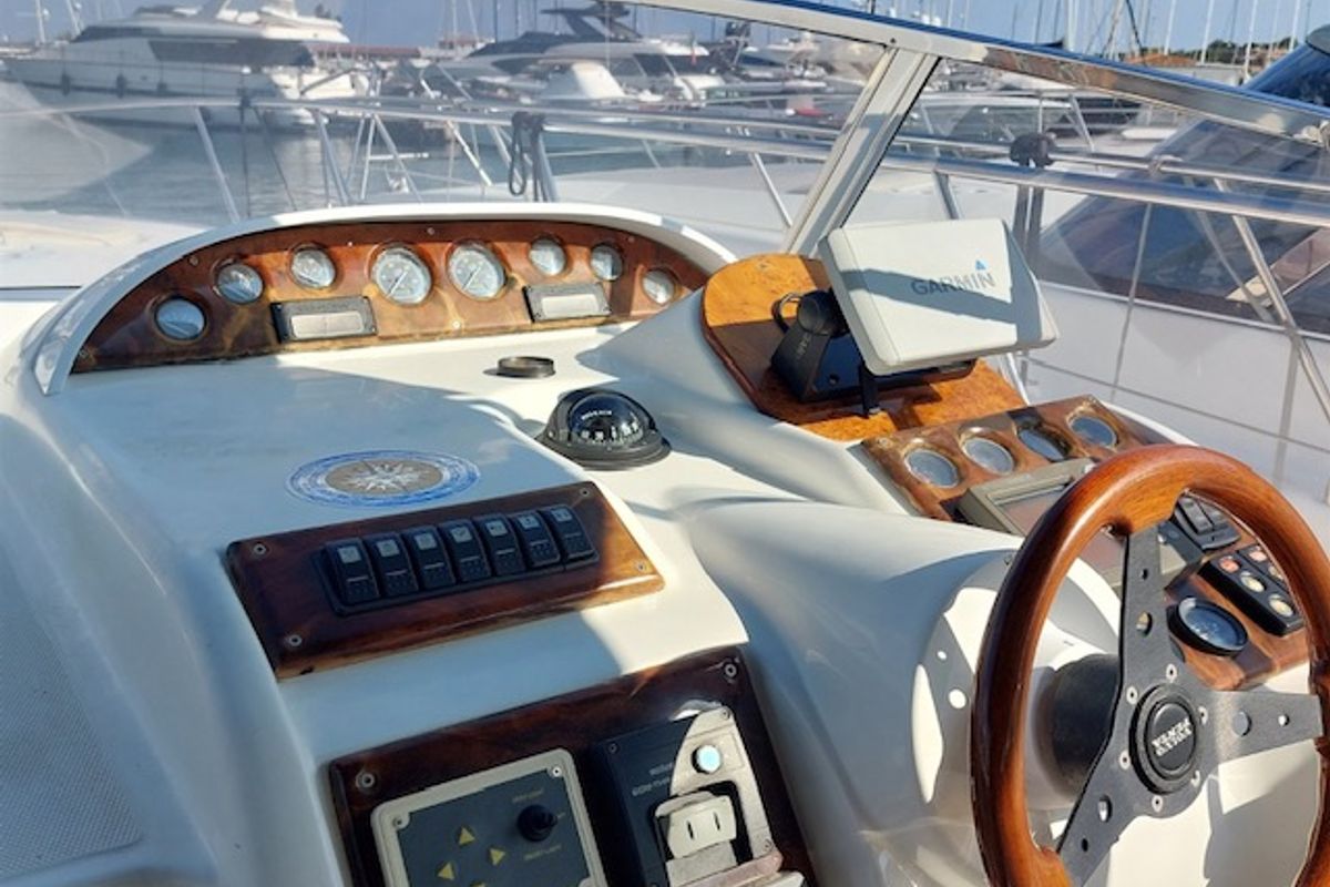Cockpit of Notorius, a Mira 40 motorboat at Olbia, Italy