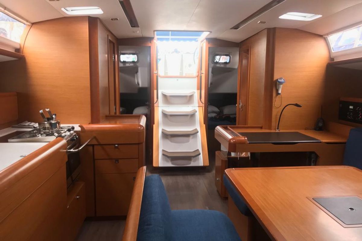 Salon of Alboran Grappa, a Jeanneau Sun Odyssey 519 sailboat at es Jonquet, Spain