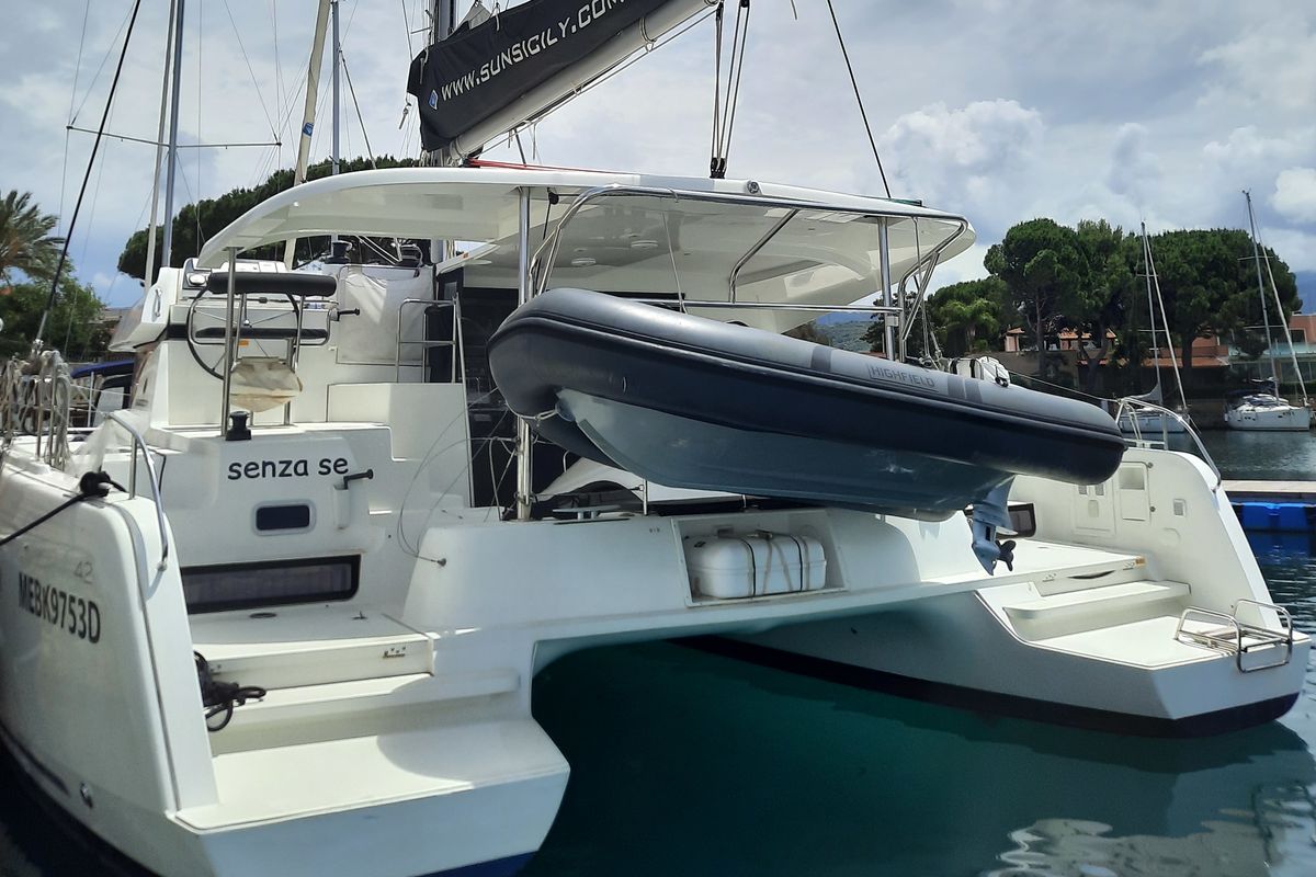 Exterior view of Senza Se, a Lagoon 42 catamaran at Tonnarella, Italy