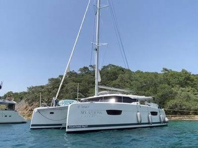 Exterior view of Sirius 1, a Fountaine Pajot Astréa 42 catamaran at Marmaris, Turkey