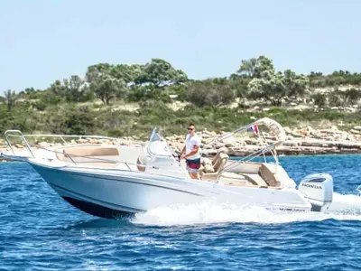 Exterior view of Cap Camarat, a Jeanneau Cap Camarat 7.5 CC motorboat at Grad Trogir, Croatia