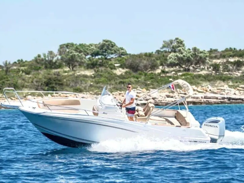 Exterior view of Cap Camarat, a Jeanneau Cap Camarat 7.5 CC motorboat at Grad Trogir, Croatia