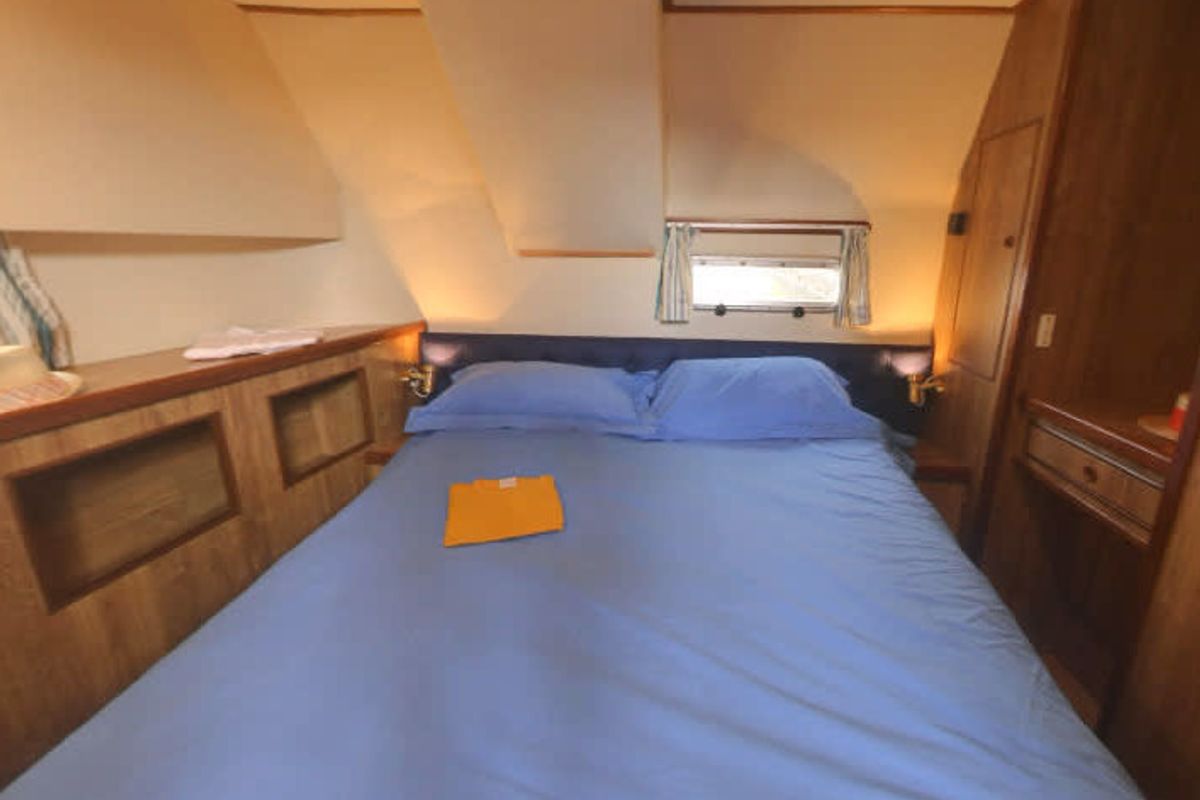 Cabin on Countess, a Cygnet Countess motorboat at Hessel, United States