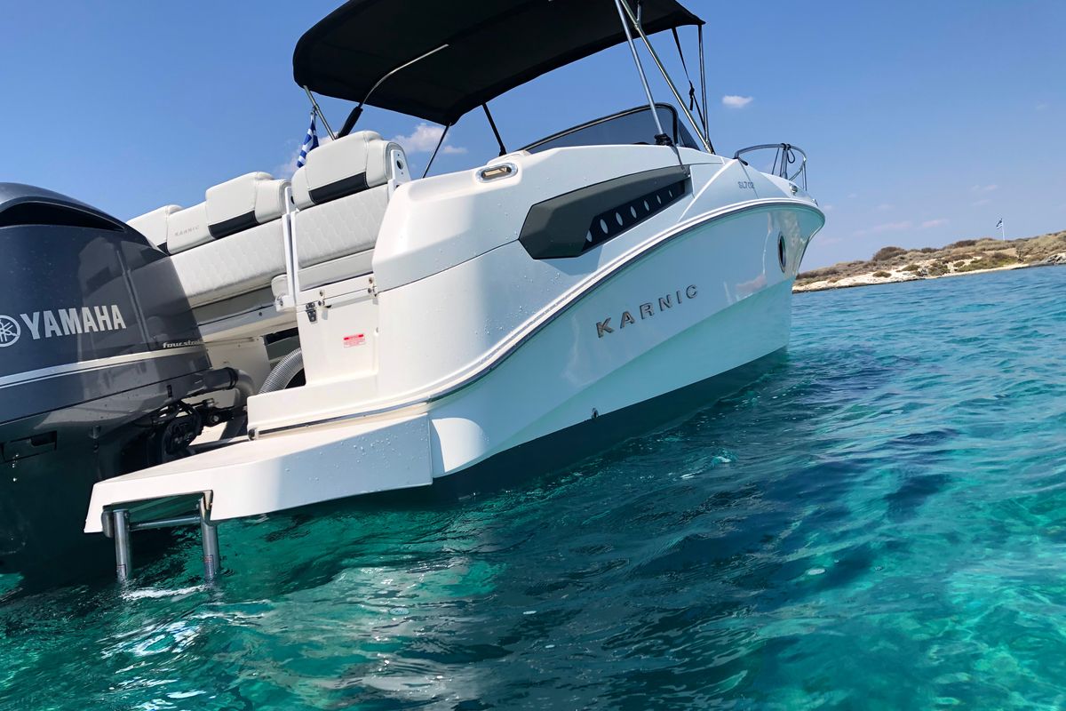 Exterior view of Meliti, a Karnic SL 702 motorboat at Lavreotiki Municipal Unit, Greece