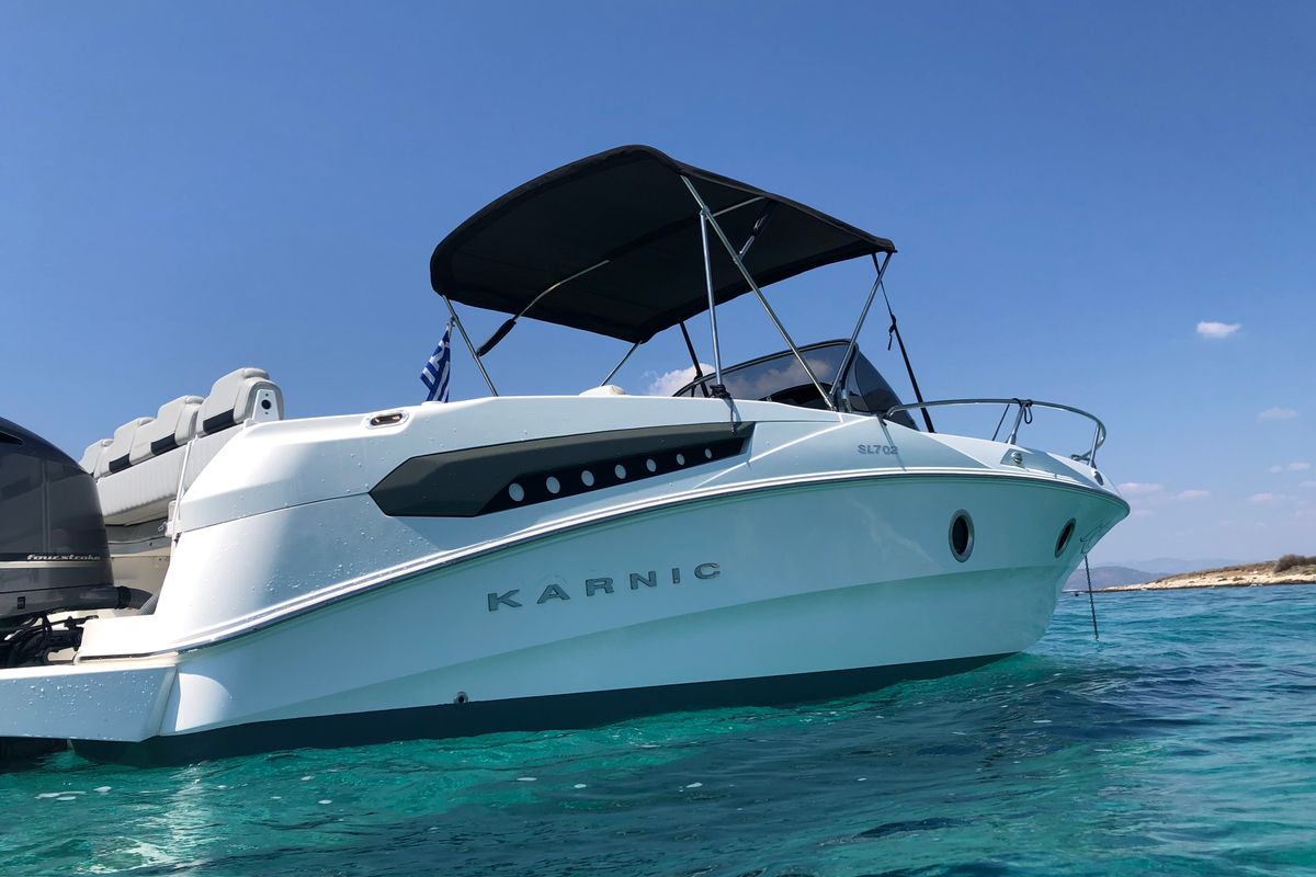 Exterior view of Meliti, a Karnic SL 702 motorboat at Lavreotiki Municipal Unit, Greece
