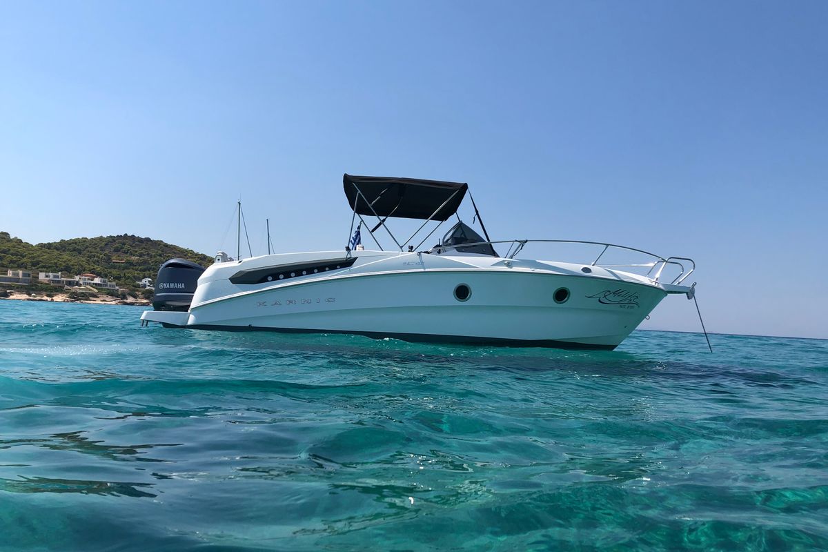 Exterior view of Meliti, a Karnic SL 702 motorboat at Lavreotiki Municipal Unit, Greece