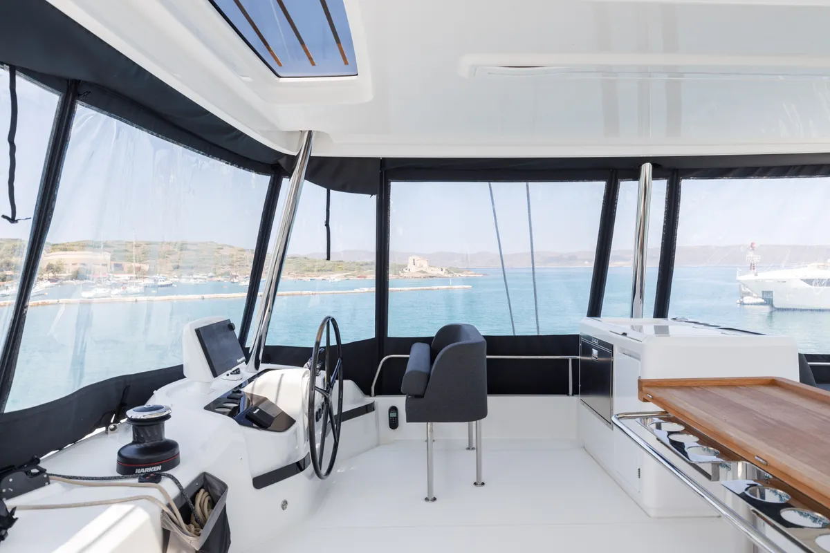 Cockpit of Adel, a Lagoon 55 catamaran at Lavreotiki Municipal Unit, Greece
