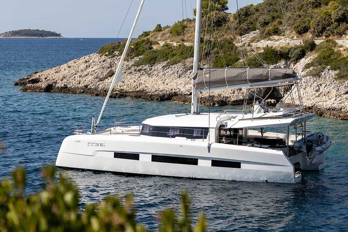 Exterior view of El Mar, a Dufour 48 Cat catamaran at Sant Antoni de Portmany, Spain