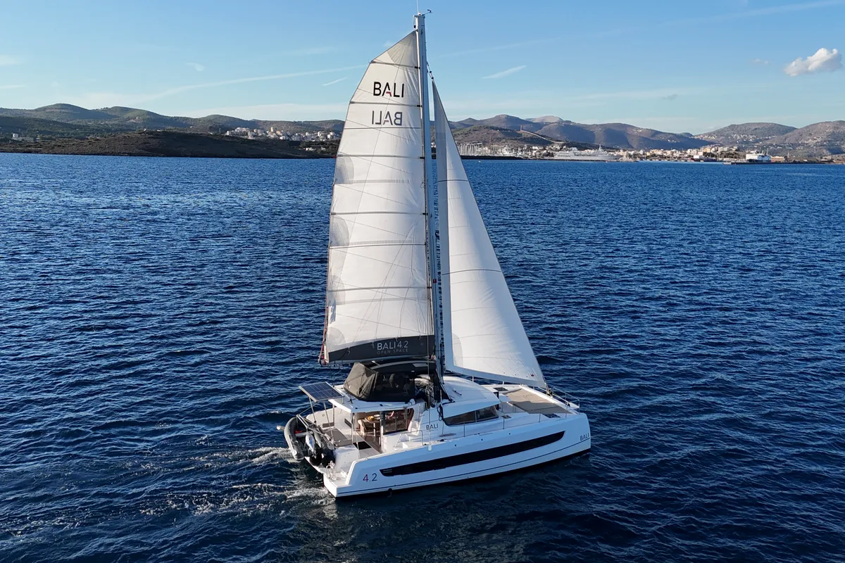 Exterior view of Jeux D'Hiver, a Bali 4.2 catamaran at Lavreotiki Municipal Unit, Greece