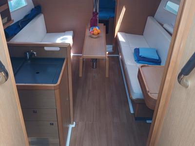 Salon of Pupatella, a Jeanneau Sun Odyssey 319 sailboat at Tonnarella, Italy