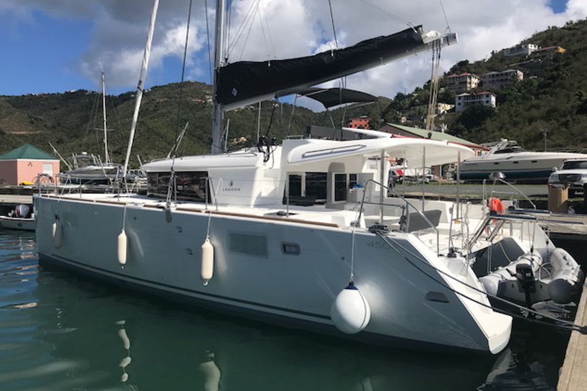 Exterior view of Paula , a Lagoon 450 catamaran at Sant Antoni de Portmany, Spain