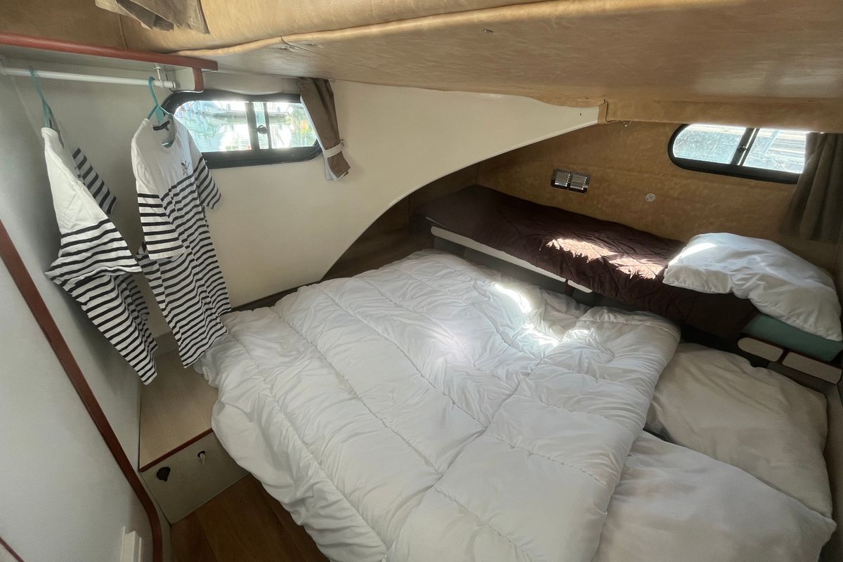 Cabin on Adagio, a Nicols Confort 1100 motorboat at Grez-Neuville, France