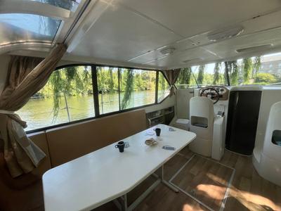 Cockpit of Adagio, a Nicols Confort 1100 motorboat at Grez-Neuville, France