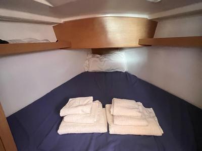 Cabin on Lazzarone, a Jeanneau Sun Odyssey 319 sailboat at Cannigione, Italy