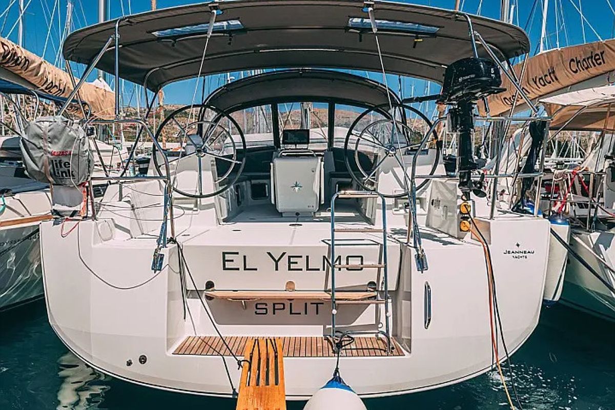 Exterior view of Yelmo, a Jeanneau 54 sailboat at Sant Antoni de Portmany, Spain