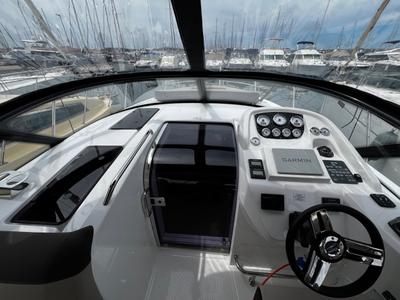 Cockpit of Denver, a Bavaria S29+ motorboat at Grad Biograd na Moru, Croatia
