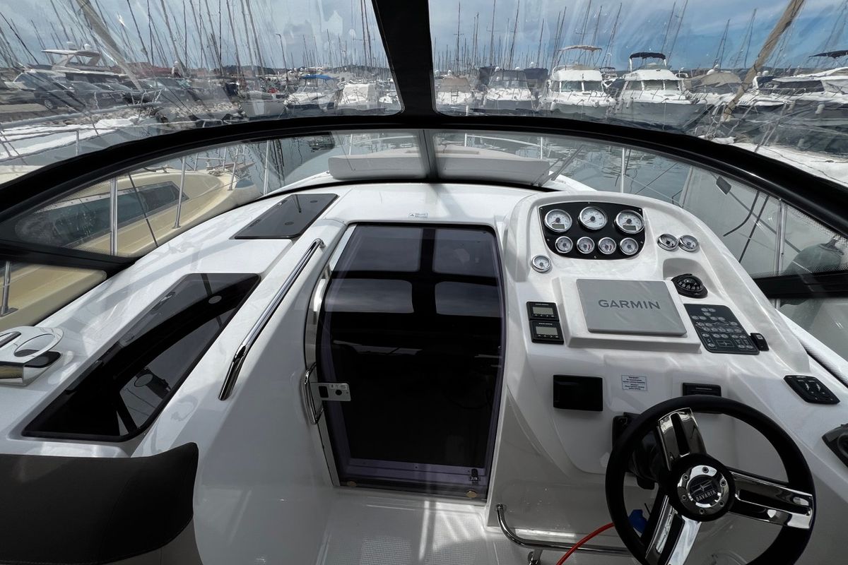 Cockpit of Denver, a Bavaria S29+ motorboat at Grad Biograd na Moru, Croatia