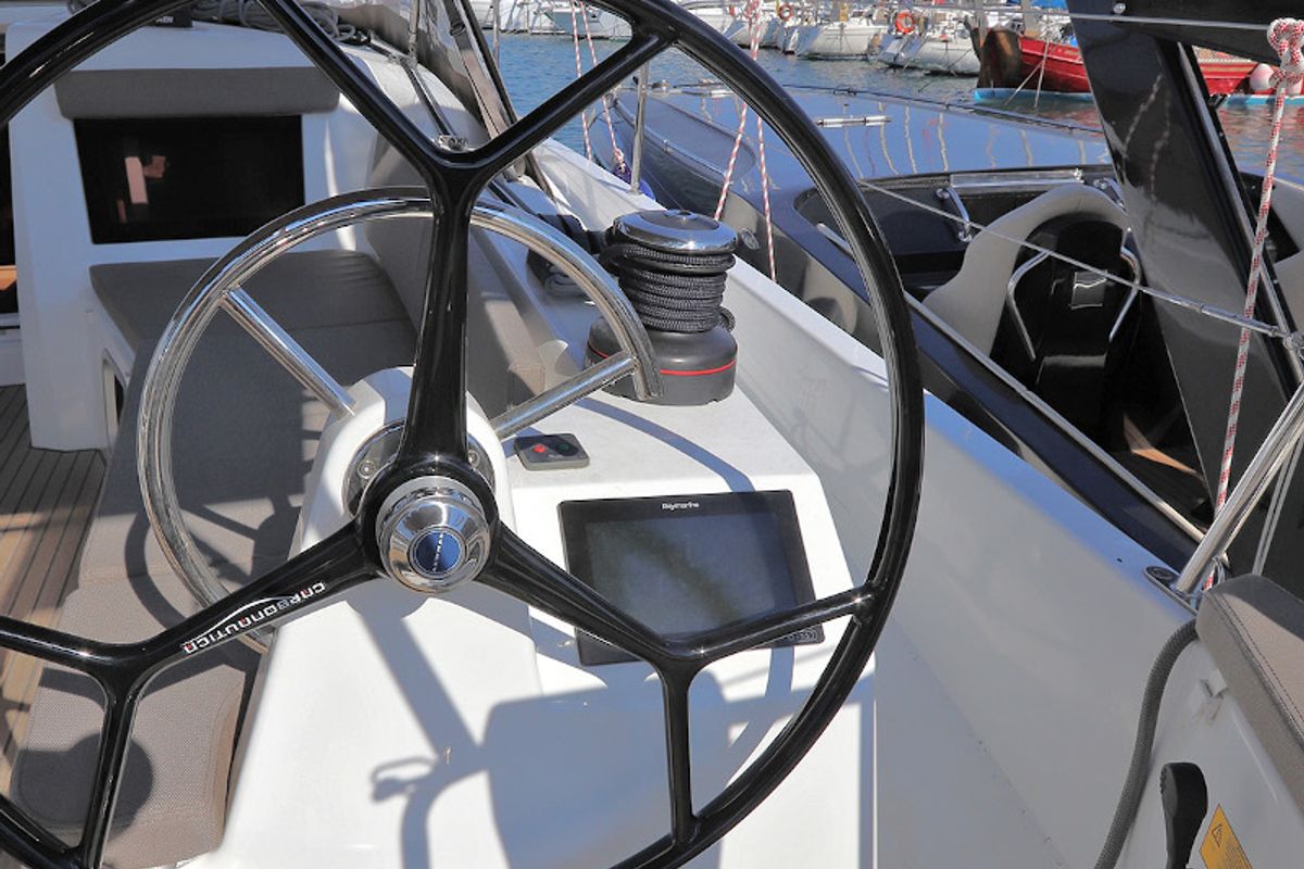 Cockpit of Aris, a Jeanneau Sun Odyssey 410 sailboat at Lavreotiki Municipal Unit, Greece