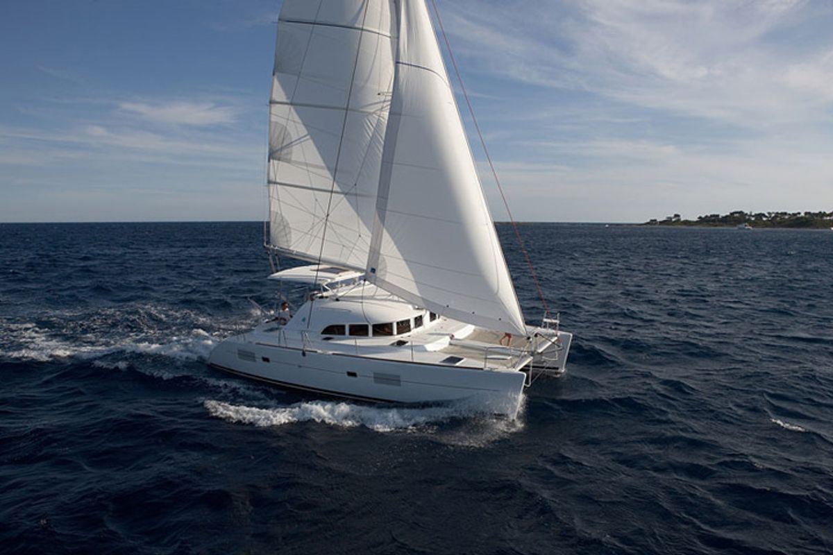 Exterior view of blue elli, a Lagoon 380 S2 catamaran at Kontokali, Greece
