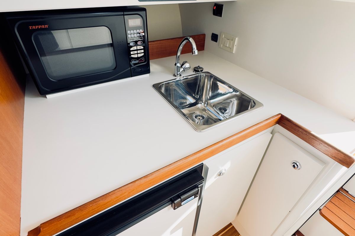 Galley of Fiki, a Tiara Yachts Tiara 2900 Coronet motorboat at Municipal Unit of Kranidi, Greece