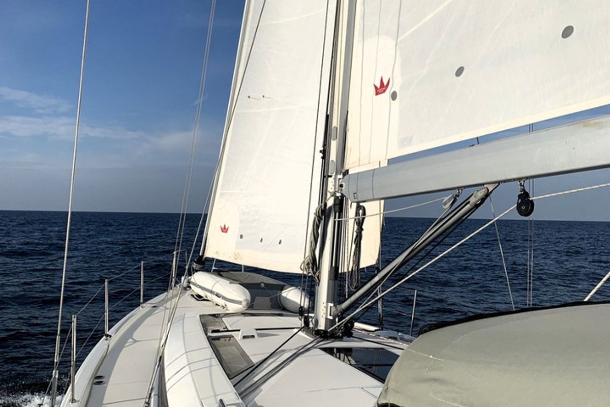 Exterior view of Avocado, a Beneteau Oceanis 51.1 sailboat at Cala Egos, Spain