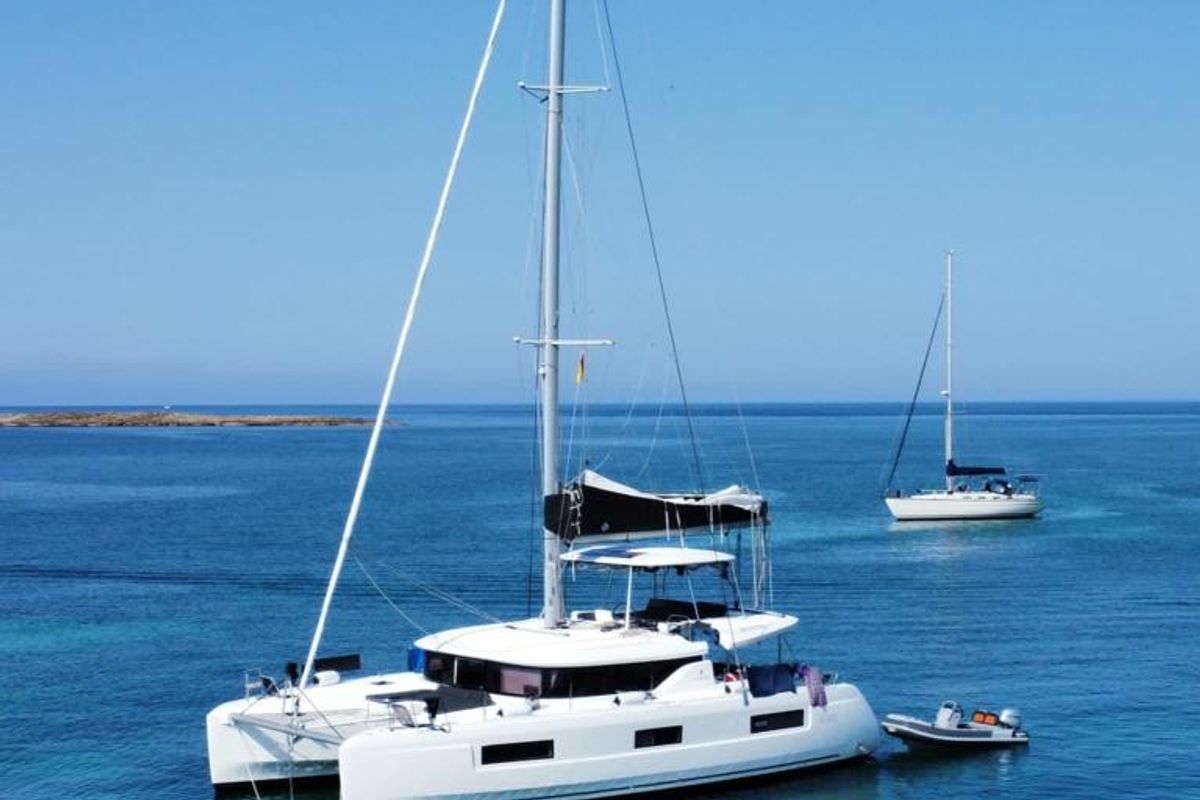 Exterior view of Amanaci, a Lagoon 46 catamaran at Palma de Mallorca, Spain