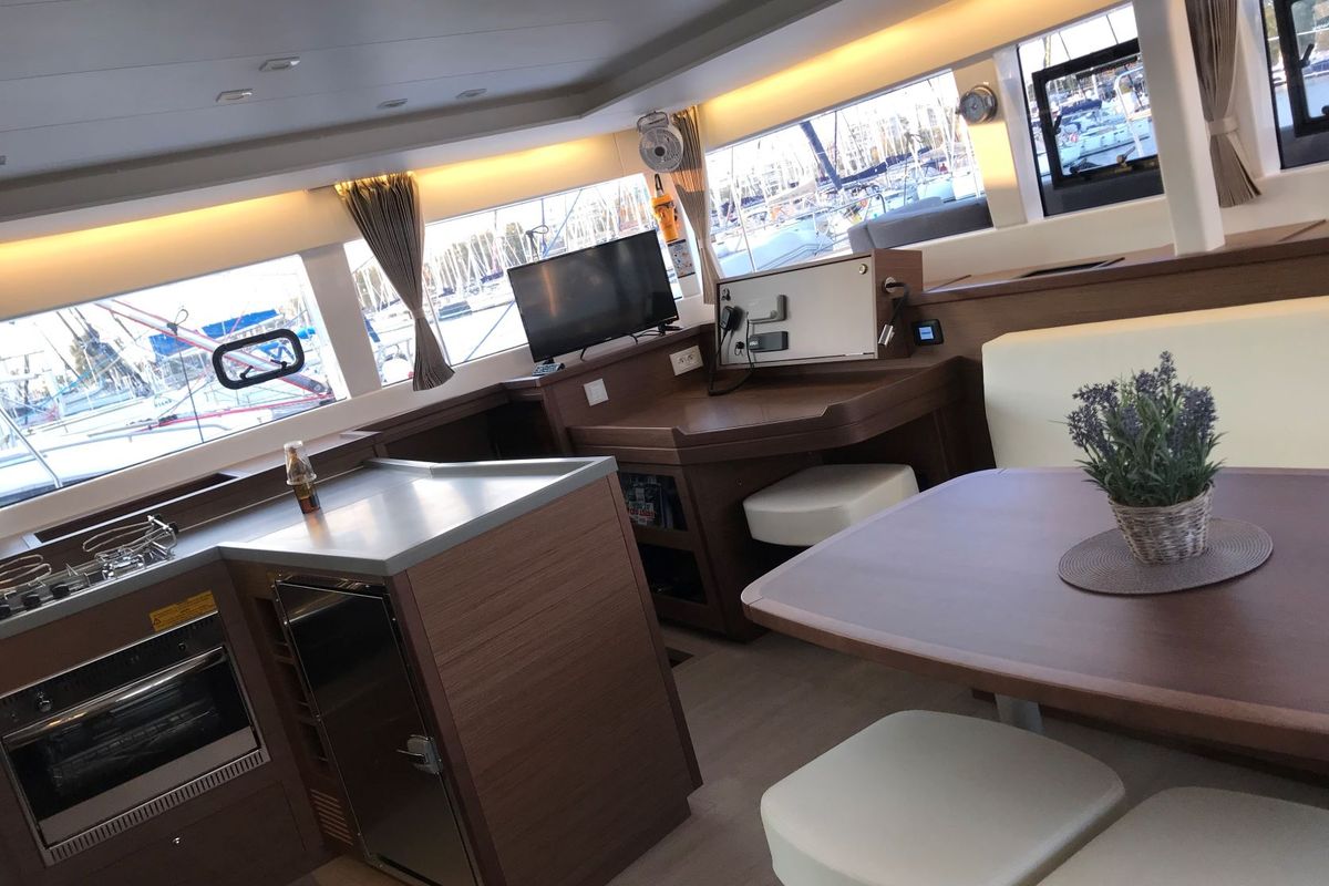 Salon of ISMA, a Lagoon 450 Fly catamaran at Municipal Unit of Lefkada, Greece