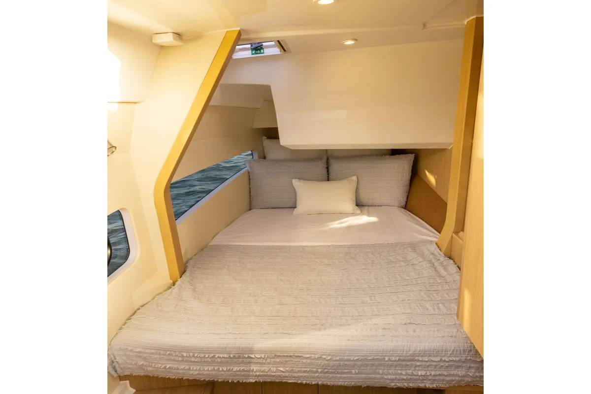 Cabin on Aquilotto, a Aquila Yachts Aquila 32 Sport catamaran at Cannigione, Italy