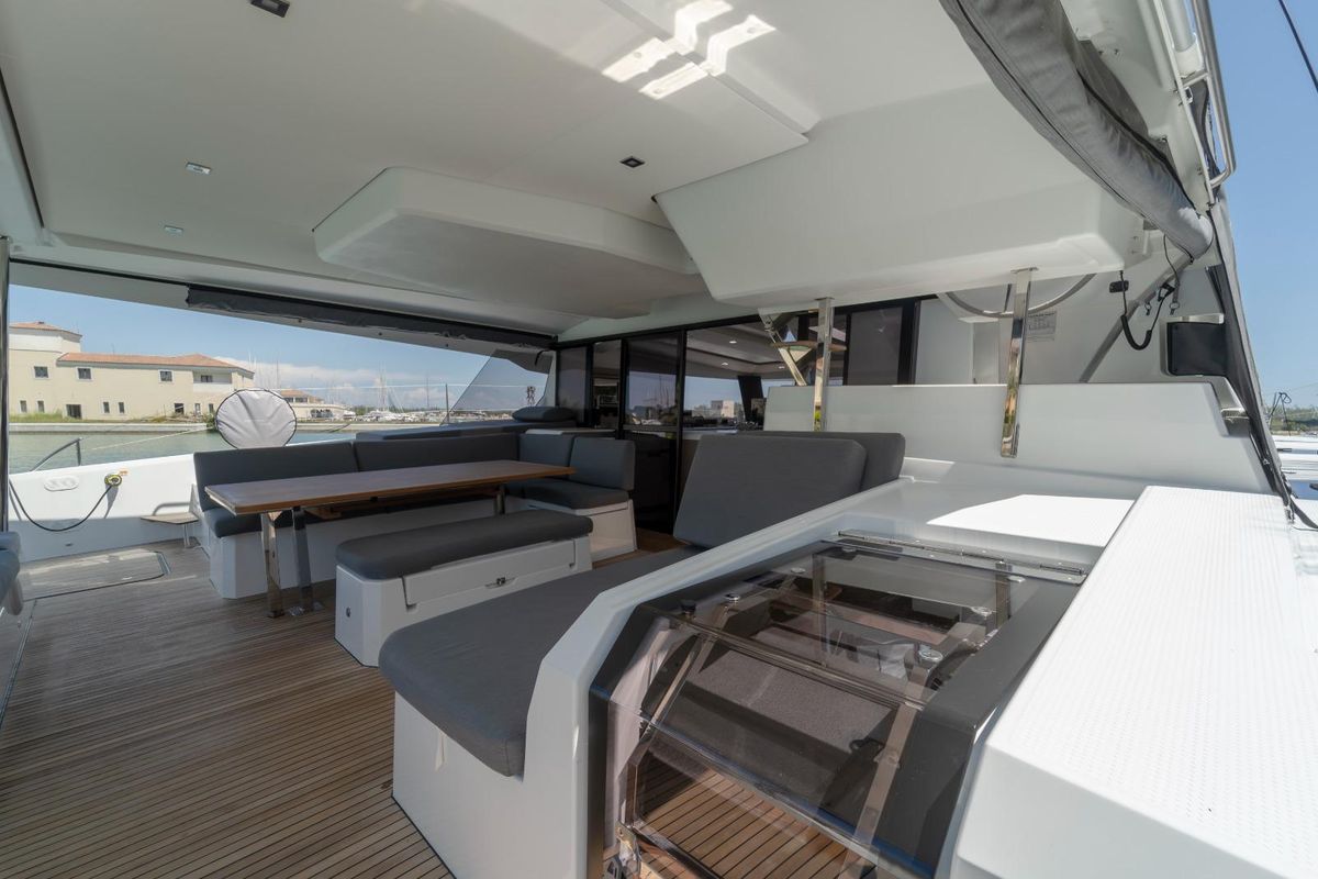 Deck of Kali II, a Fountaine Pajot Aura 51 catamaran at Capo d'Orlando, Italy