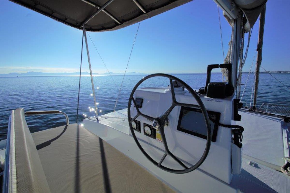Cockpit of Albert, a Bali 4.5 catamaran at Port de Pollença, Spain