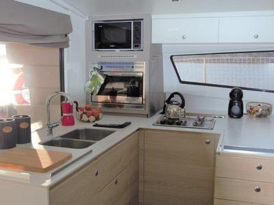 Galley of Albert, a Bali 4.5 catamaran at Port de Pollença, Spain