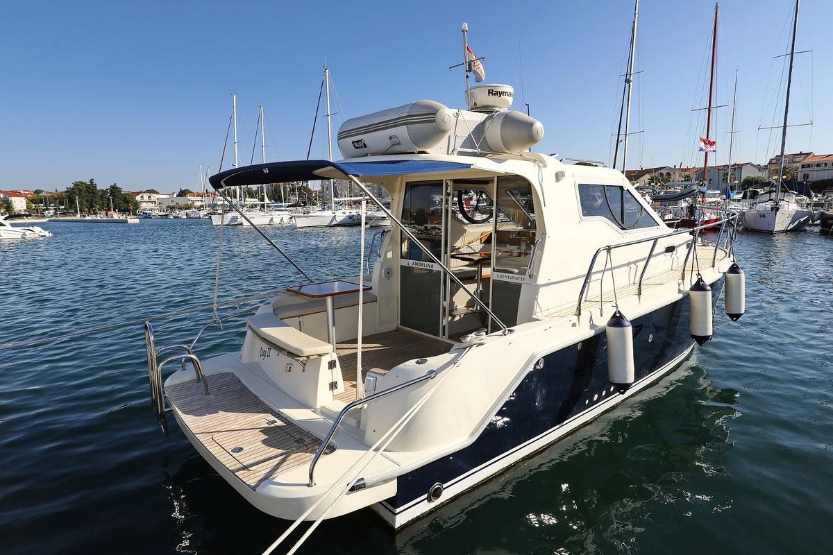 Exterior view of Dugi II, a SAS - Vektor Vektor 950 motorboat at Grad Biograd na Moru, Croatia