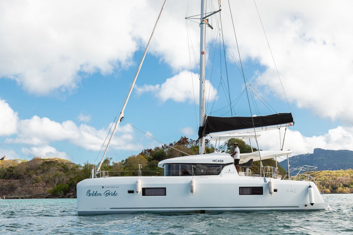 Exterior view of Golden Bride, a Lagoon 42 catamaran at Eden Island Marina, Seychelles