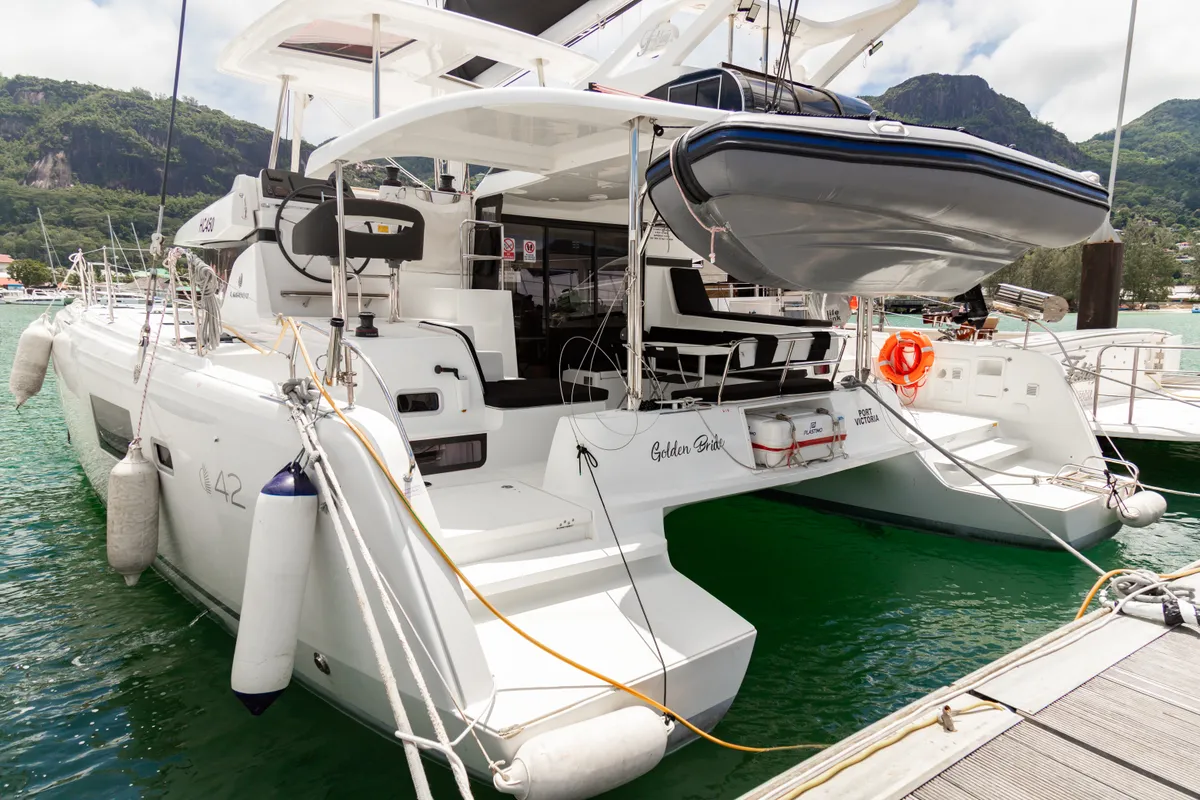 Exterior view of Golden Bride, a Lagoon 42 catamaran at Eden Island Marina, Seychelles
