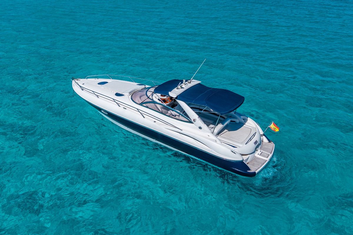 Exterior view of Pompa, a Sunseeker Hawk 34 motorboat at Ibiza, Spain