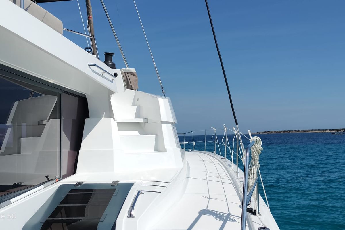 Deck of Spritz "New 2024", a Bali 5.4 catamaran at Figari/Golfo Aranci, Italy