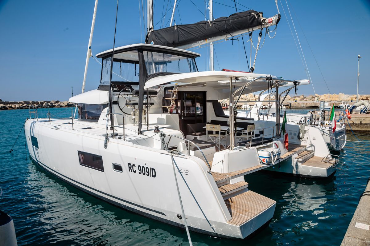 Exterior view of Brivido - Premium line , a Lagoon 42 catamaran at Capo d'Orlando, Italy